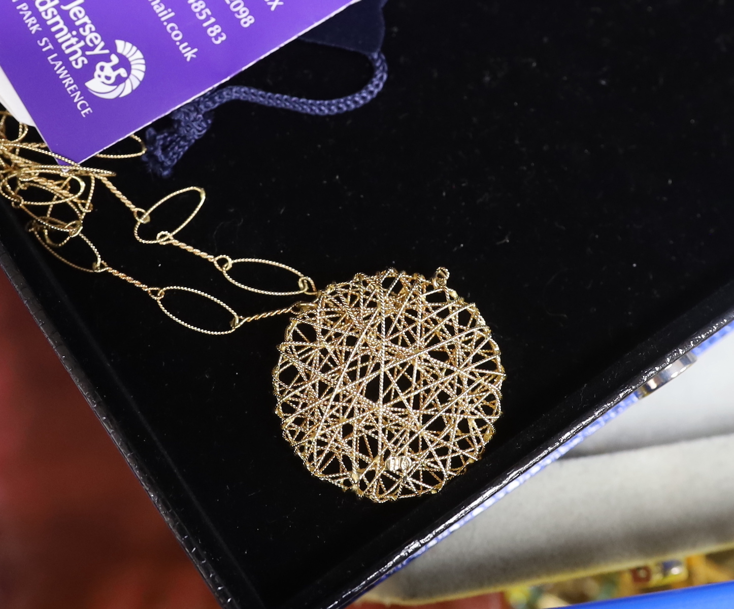 Costume jewellery including a case of earrings.